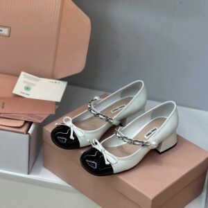 Miu Miu White Patent Leather Pumps